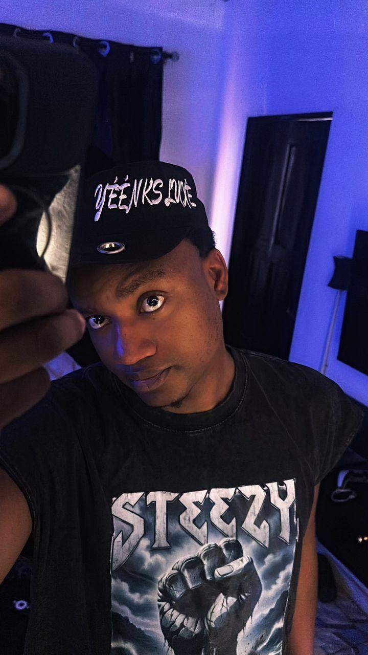 YEENKSLUXE cap and graphic tee styled by a customer